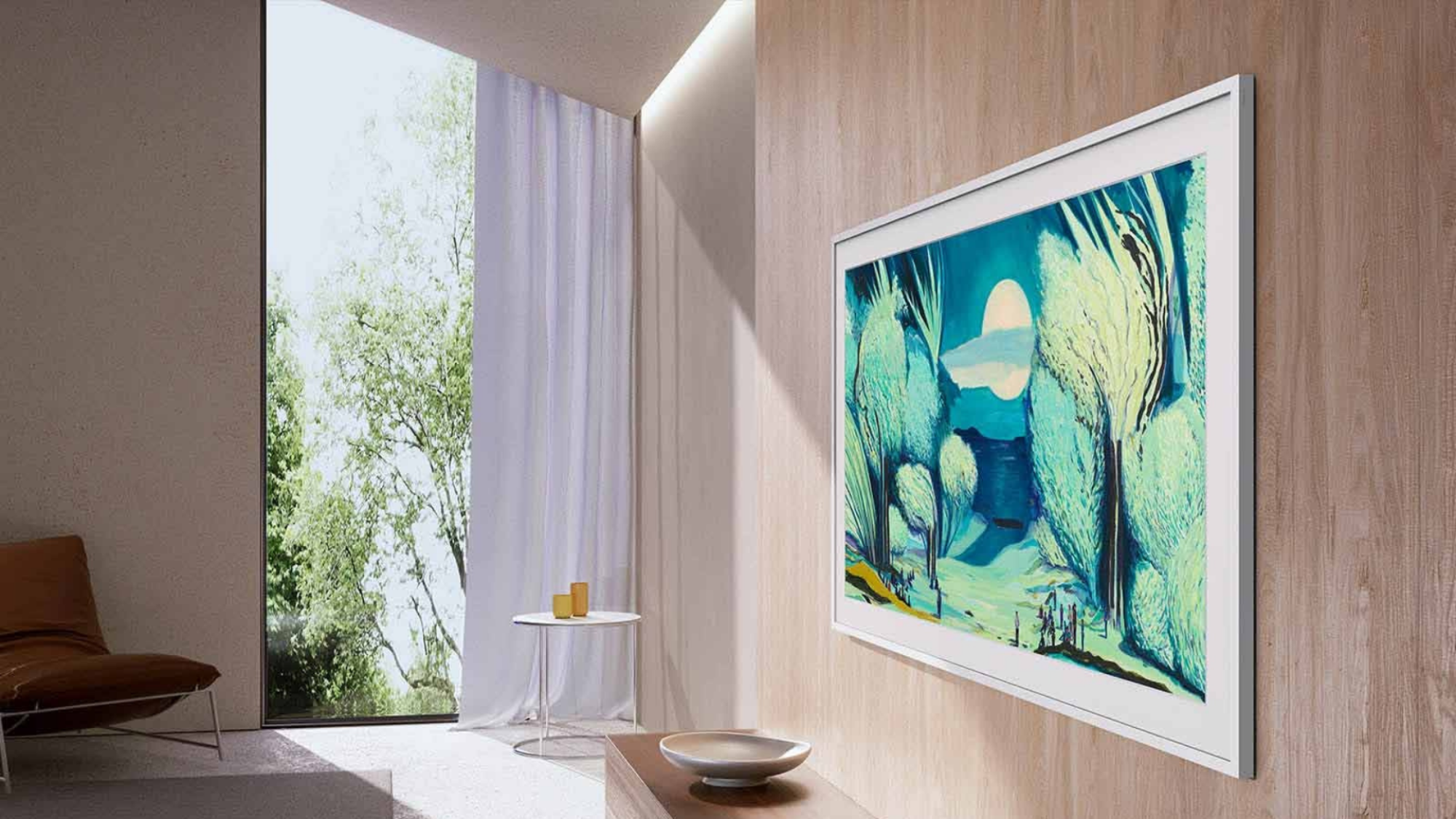 A 2025 The Frame TV mounted on a wall.