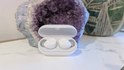 sony wf-c710n earbuds in front of a purple geode