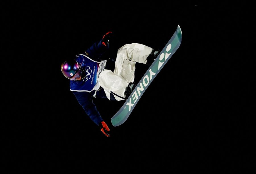Kira Kimura of Japan in action during his third run of snowboard big air at the Milan Cortina Olympi